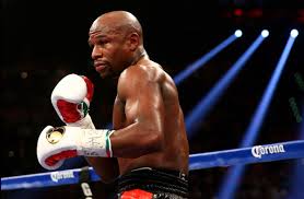 Floyd Mayweather se retrage cu o victorie la puncte