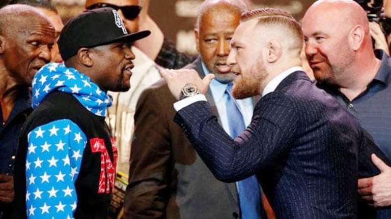 Mayweather și McGregor se confruntă duminică dimineață